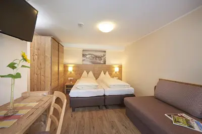 Ein Bett oder Betten in einem Zimmer der Unterkunft Pension Gabi