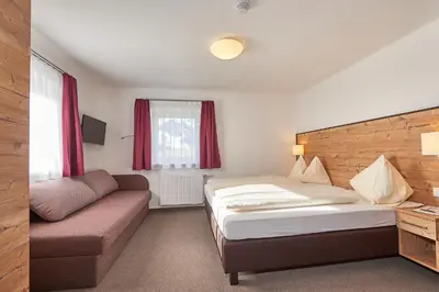 Ein Bett oder Betten in einem Zimmer der Unterkunft Pension Gabi