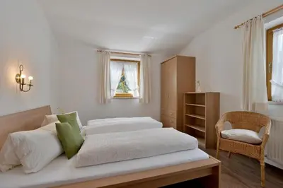 Ein Bett oder Betten in einem Zimmer der Unterkunft Ferienwohnung Rahm