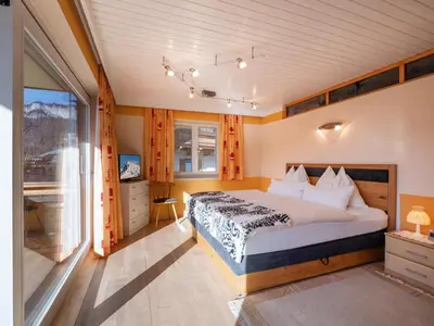 Ein Bett oder Betten in einem Zimmer der Unterkunft Exklusiv Apartment Hofer
