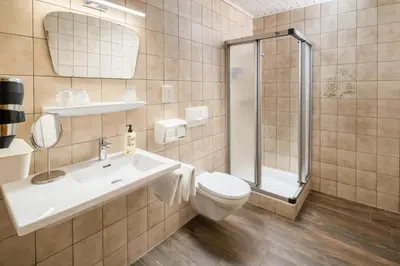 Ein Badezimmer in der Unterkunft Hotel Standlhof Zillertal