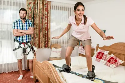Ein Bett oder Betten in einem Zimmer der Unterkunft Hotel Standlhof Zillertal