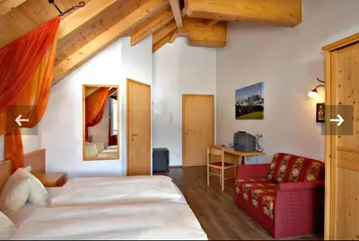 Ein Bett oder Betten in einem Zimmer der Unterkunft Appartementhaus Chalet Alpina