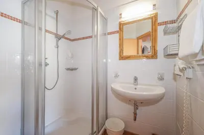 Ein Badezimmer in der Unterkunft Appartementhaus Chalet Alpina
