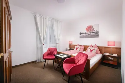 Ein Sitzbereich in der Unterkunft Gästehaus Greger