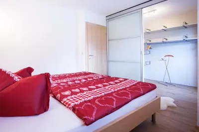 Ein Bett oder Betten in einem Zimmer der Unterkunft Ferienhaus Alex