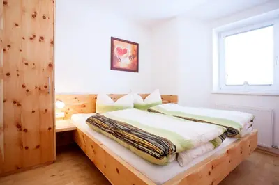 Ein Bett oder Betten in einem Zimmer der Unterkunft Ferienhaus Alex