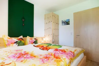 Ein Bett oder Betten in einem Zimmer der Unterkunft Ferienhaus Alex
