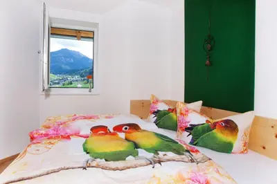 Ein Bett oder Betten in einem Zimmer der Unterkunft Ferienhaus Alex