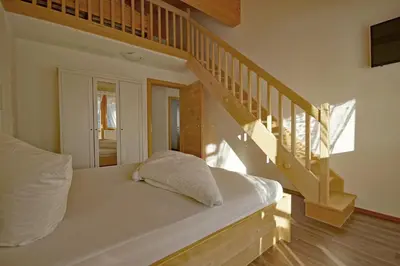 Ein Bett oder Betten in einem Zimmer der Unterkunft Der Ottenhof