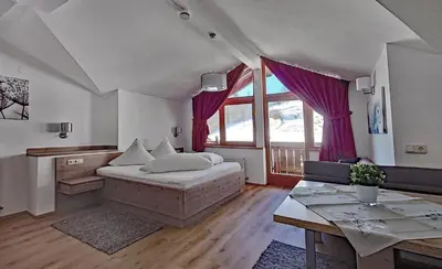 Ein Bett oder Betten in einem Zimmer der Unterkunft Der Ottenhof