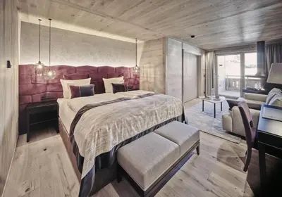 Ein Bett oder Betten in einem Zimmer der Unterkunft Cocoon - Alpine Boutique Lodge
