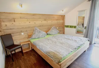 Ein Bett oder Betten in einem Zimmer der Unterkunft Basislager Fieberbrunn