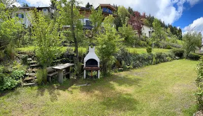 Ein Garten an der Unterkunft Basislager Fieberbrunn