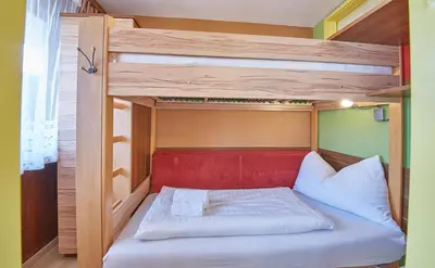 Ein Bett oder Betten in einem Zimmer der Unterkunft Appartement Active