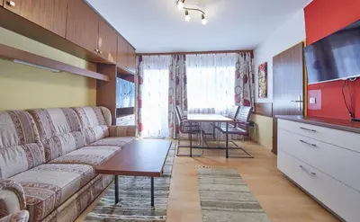 Ein Sitzbereich in der Unterkunft Appartement Active