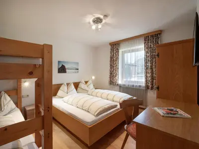 Ein Bett oder Betten in einem Zimmer der Unterkunft Apartment-Pension Schmiedererhof
