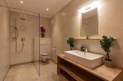 Ein Badezimmer in der Unterkunft Berggasthof Staudachstub'n