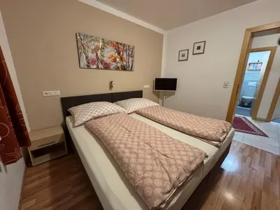 Ein Bett oder Betten in einem Zimmer der Unterkunft Ferienwohnung Walder