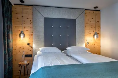 Ein Bett oder Betten in einem Zimmer der Unterkunft Hotel das Zwölferhaus