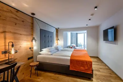 Ein Bett oder Betten in einem Zimmer der Unterkunft Hotel das Zwölferhaus