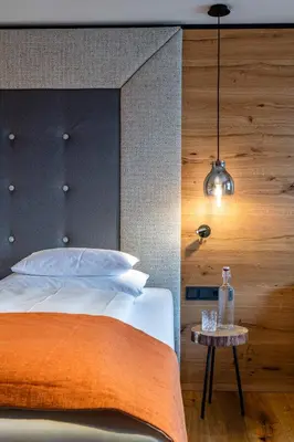 Ein Bett oder Betten in einem Zimmer der Unterkunft Hotel das Zwölferhaus