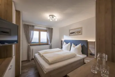 Ein Bett oder Betten in einem Zimmer der Unterkunft Haus Auni Metzgermeister