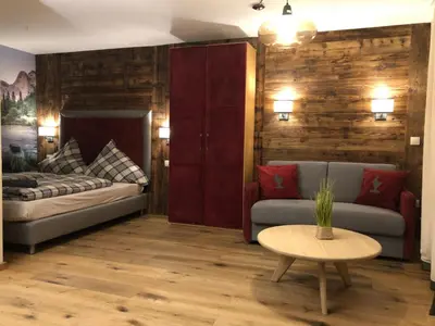 Ein Bett oder Betten in einem Zimmer der Unterkunft Kitzbühel City 1