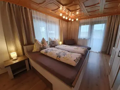 Ein Bett oder Betten in einem Zimmer der Unterkunft Haus Lisa