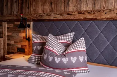 Ein Bett oder Betten in einem Zimmer der Unterkunft Alpen Chalet Wohnung 