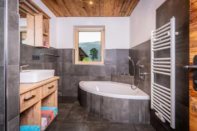 Ein Badezimmer in der Unterkunft Alpen Chalet Wohnung 