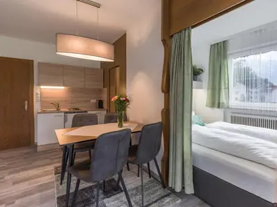 Ein Bett oder Betten in einem Zimmer der Unterkunft Appartementhaus Montana