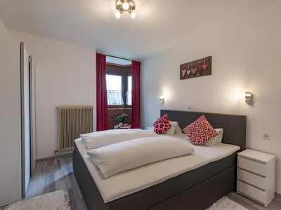 Ein Bett oder Betten in einem Zimmer der Unterkunft Appartementhaus Montana