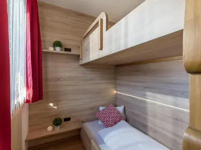 Ein Bett oder Betten in einem Zimmer der Unterkunft Appartementhaus Montana