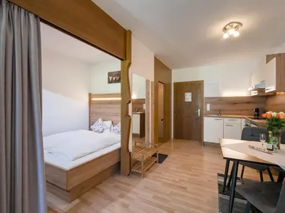 Ein Bett oder Betten in einem Zimmer der Unterkunft Appartementhaus Montana