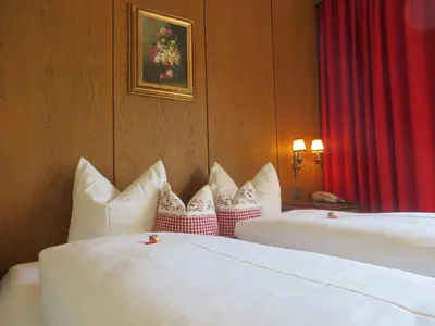 Ein Bett oder Betten in einem Zimmer der Unterkunft Pension Mühlbachhof