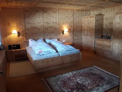 Ein Bett oder Betten in einem Zimmer der Unterkunft Alpenchalet