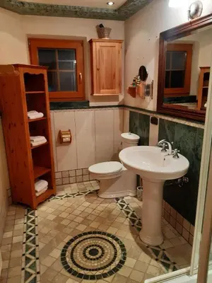 Ein Badezimmer in der Unterkunft Alpenchalet