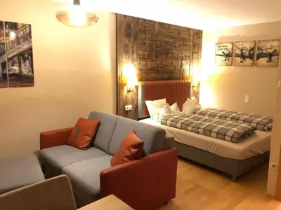 Ein Bett oder Betten in einem Zimmer der Unterkunft Kitzbühel City 2