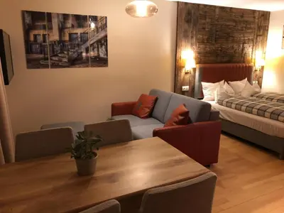 Ein Bett oder Betten in einem Zimmer der Unterkunft Kitzbühel City 2