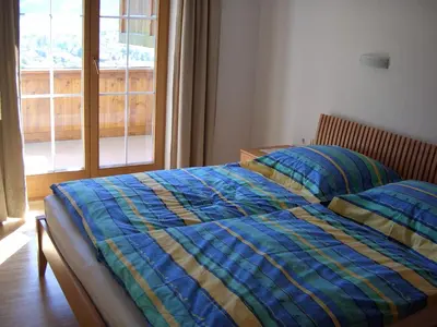 Ein Bett oder Betten in einem Zimmer der Unterkunft Ferienwohnung Sonnentraum