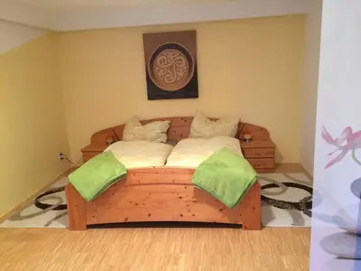 Ein Bett oder Betten in einem Zimmer der Unterkunft Familienferienwohnung Manuela Scherer