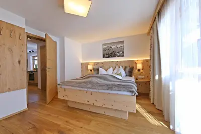 Ein Bett oder Betten in einem Zimmer der Unterkunft Martlerhof