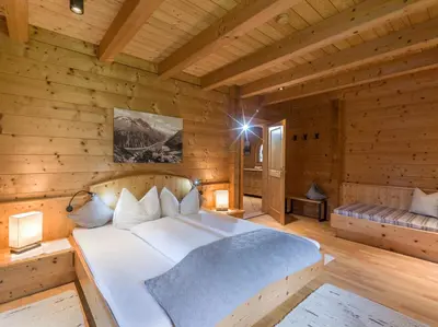 Ein Bett oder Betten in einem Zimmer der Unterkunft Martlerhof