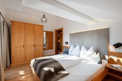 Ein Bett oder Betten in einem Zimmer der Unterkunft Martlerhof
