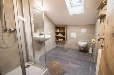 Ein Badezimmer in der Unterkunft Haus am See - Ferienhaus Reintal
