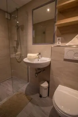 Ein Badezimmer in der Unterkunft Haus am See - Ferienhaus Reintal