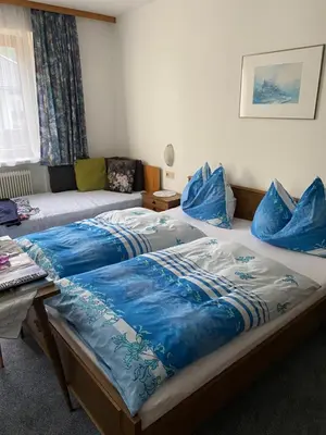 Ein Bett oder Betten in einem Zimmer der Unterkunft Gästehaus Hochwimmer