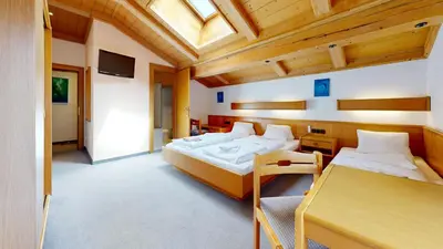 Ein Bett oder Betten in einem Zimmer der Unterkunft Brixana