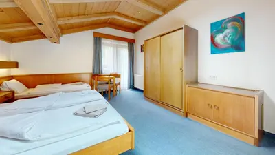 Ein Bett oder Betten in einem Zimmer der Unterkunft Brixana